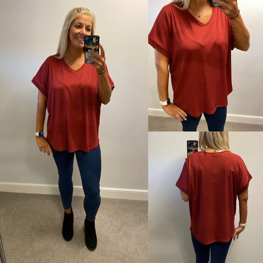 Misumi wine coloured top one size fitting upto size 18 brand new with tags