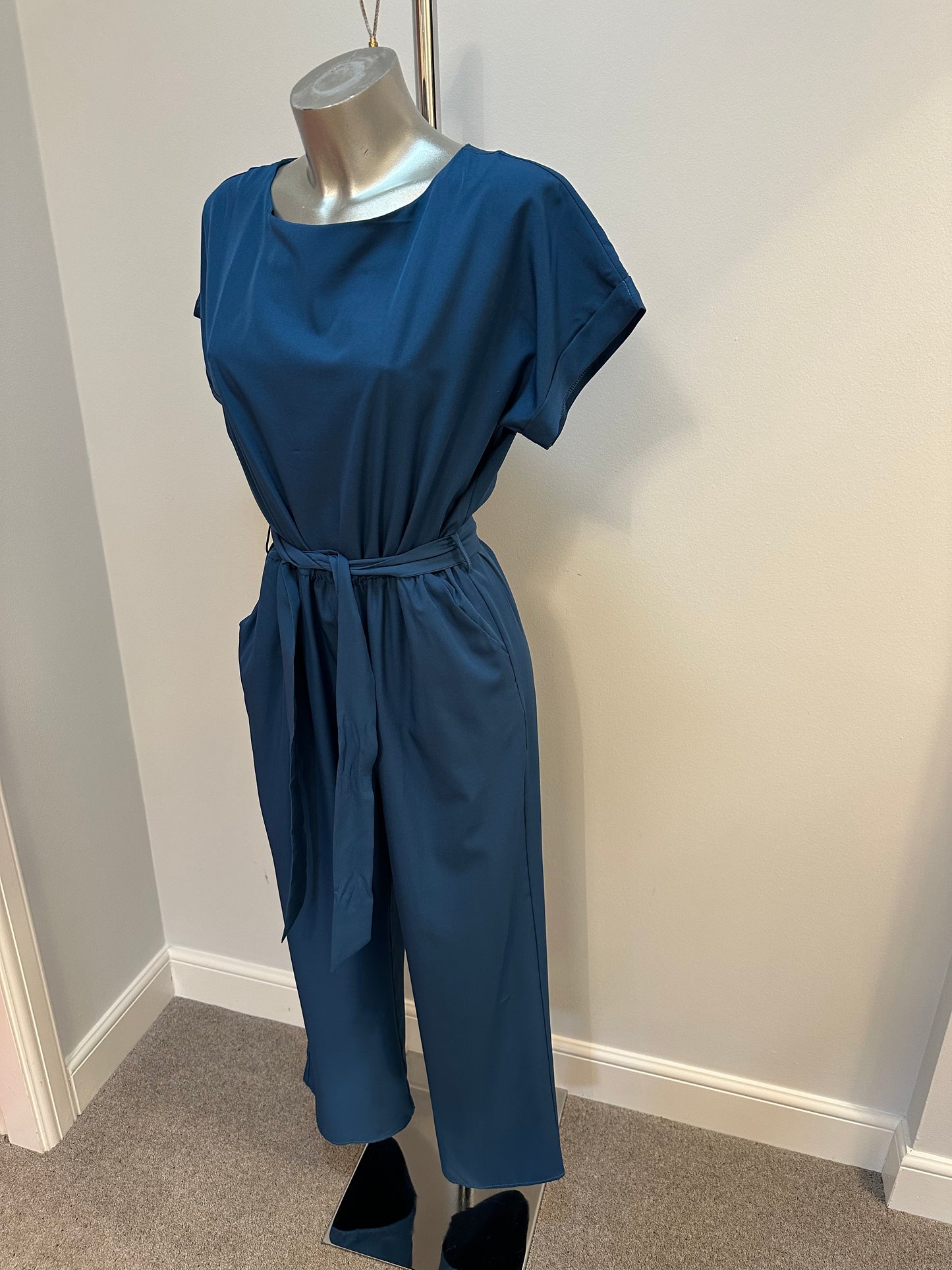 Teal Green jumpsuit with pockets onesize fitting upto size 12