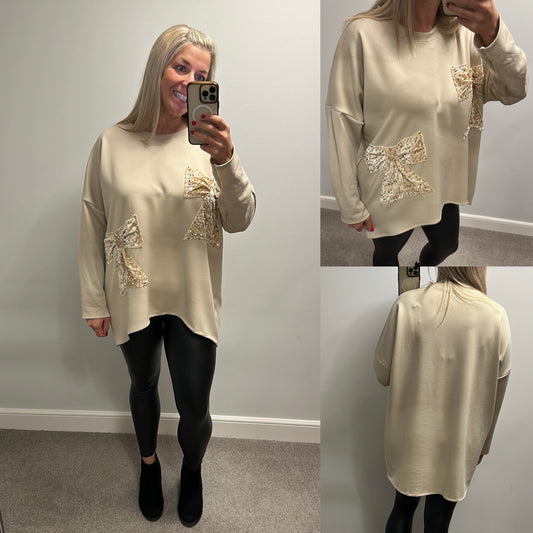 Virgo boutique beige sequin bow jumper one size fitting upto size 22 brand new with tags