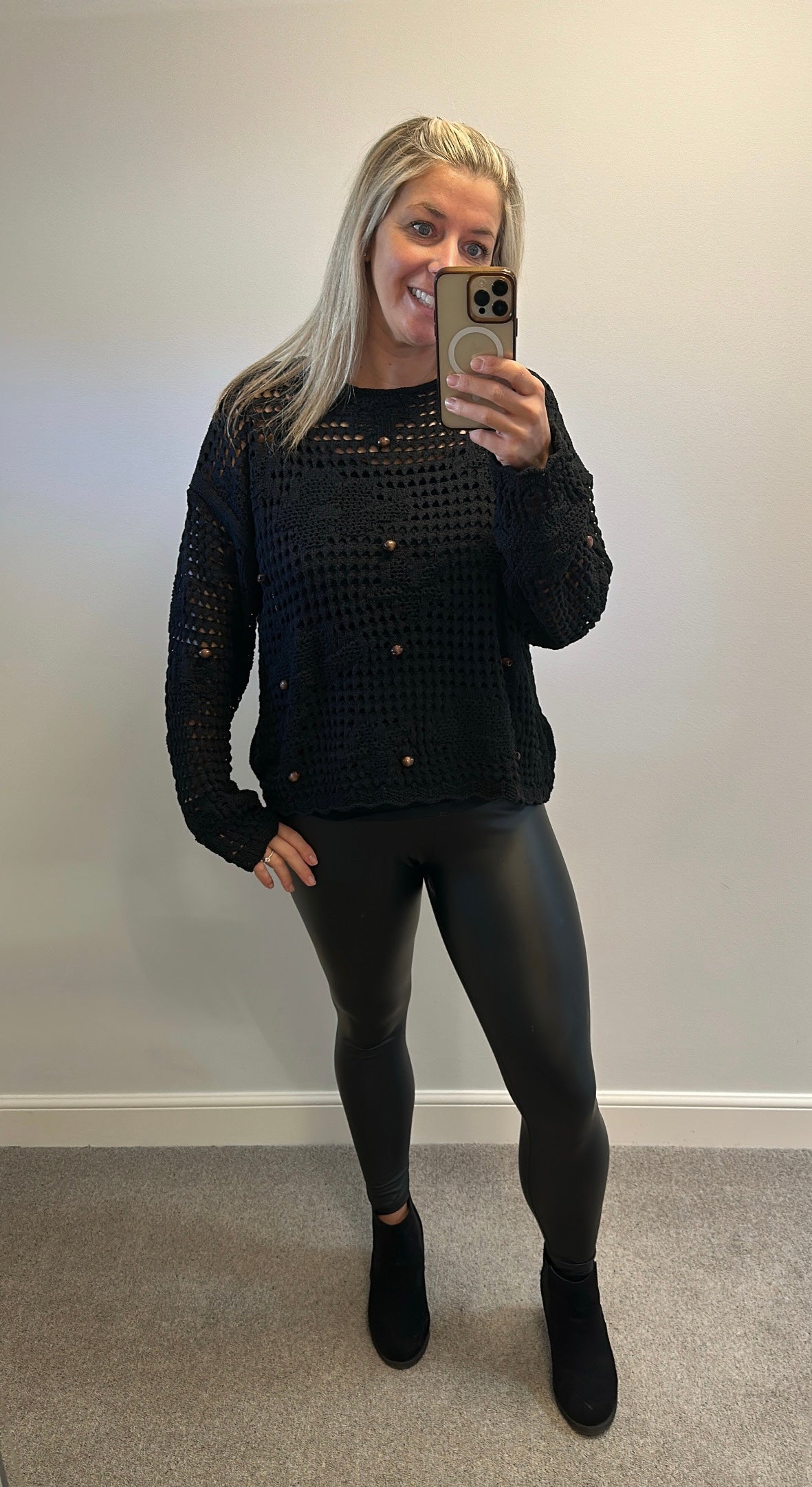 M&S black knit jumper size L would fit upto Size 18