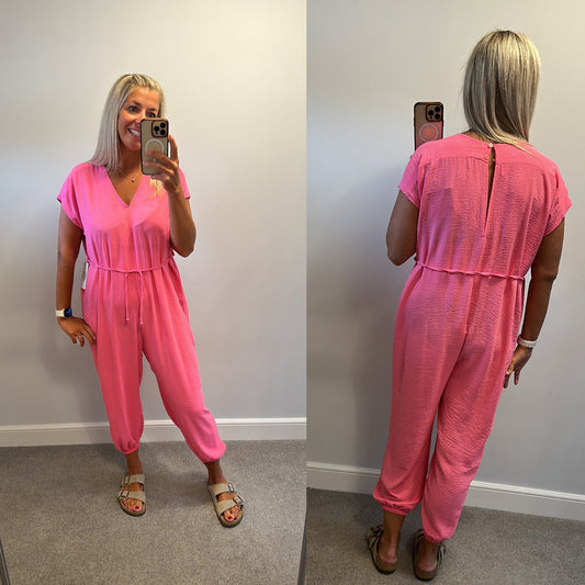 Pink jumpsuit one size fitting upto size 18 brand new with tags