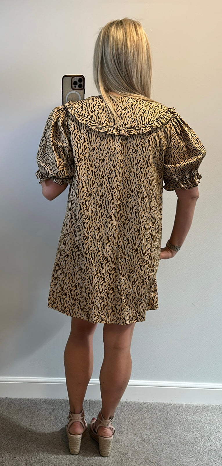 River Island beige print dress would fit up to size 14