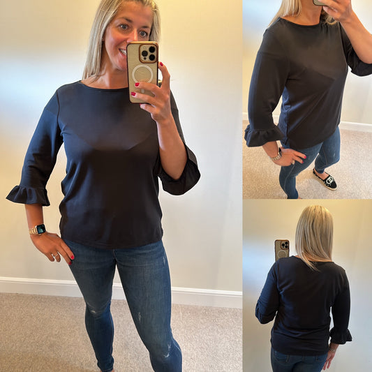 Peppercorn black top size L would fit upto size 14