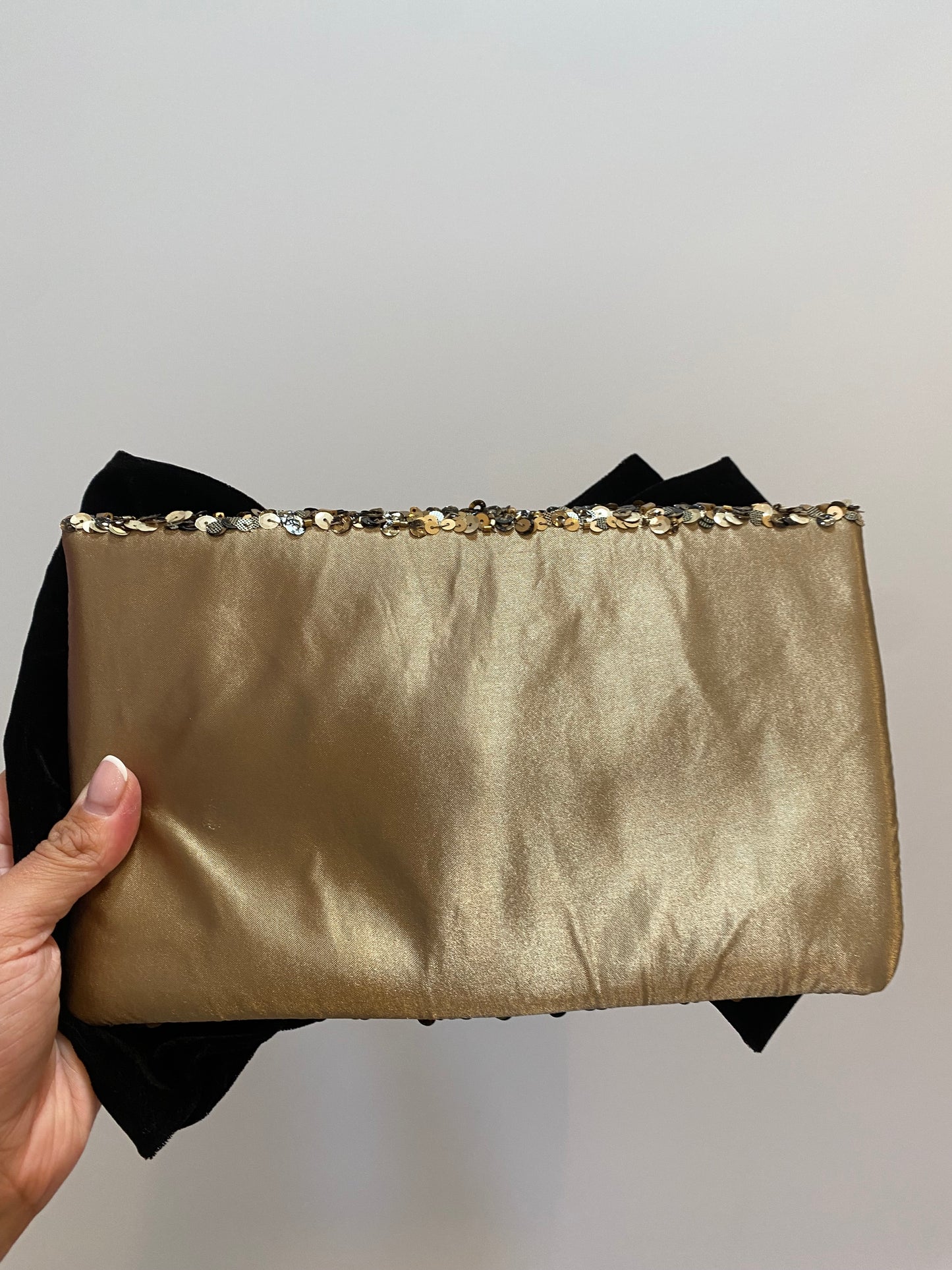 Monsoon gold sequin black bow clutch bag with strap