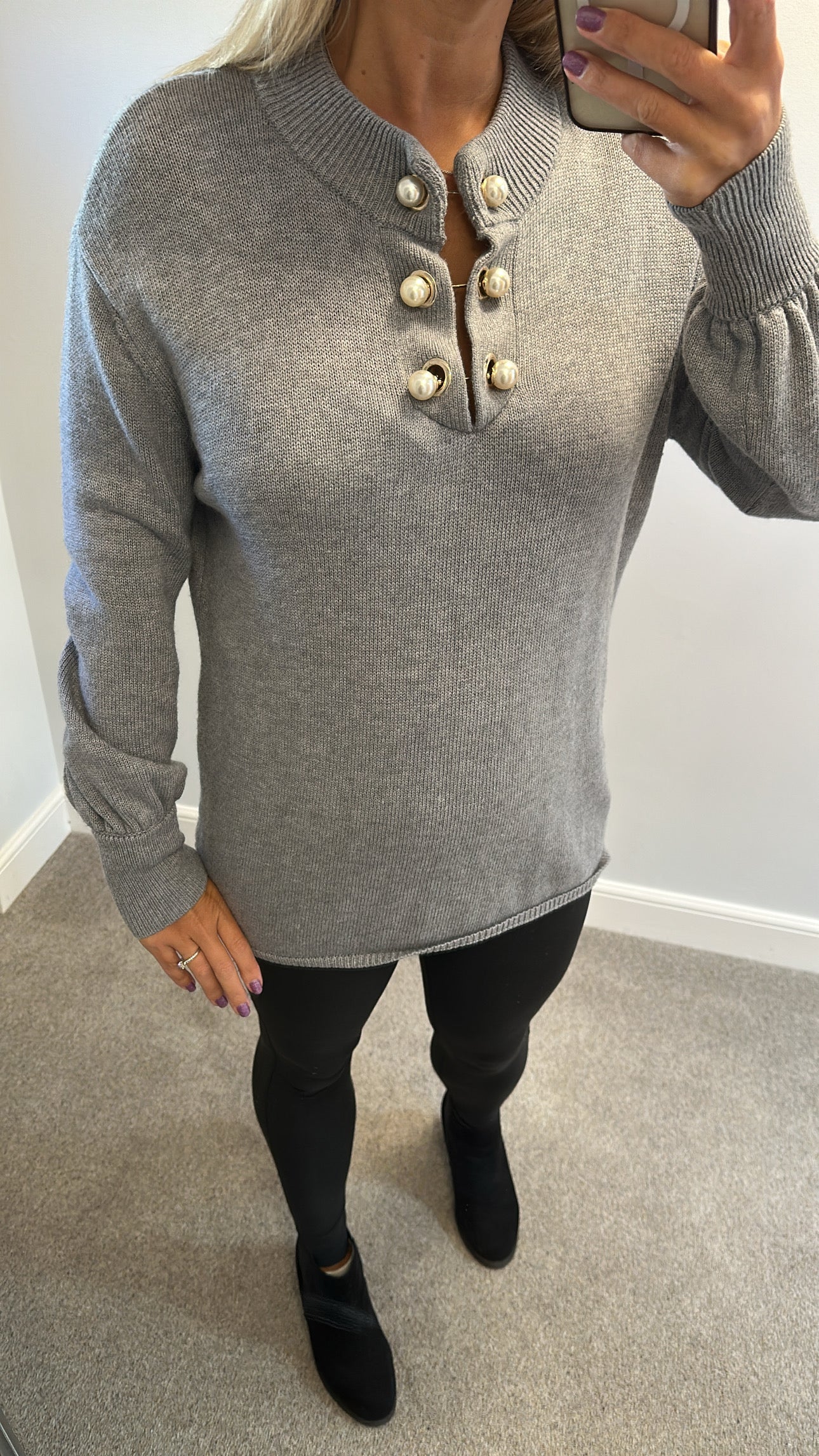 Grey knit jumper would fit upto size 18