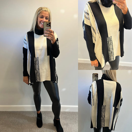 Black and cream print jumper one size fitting upto size 20 brand new without tags