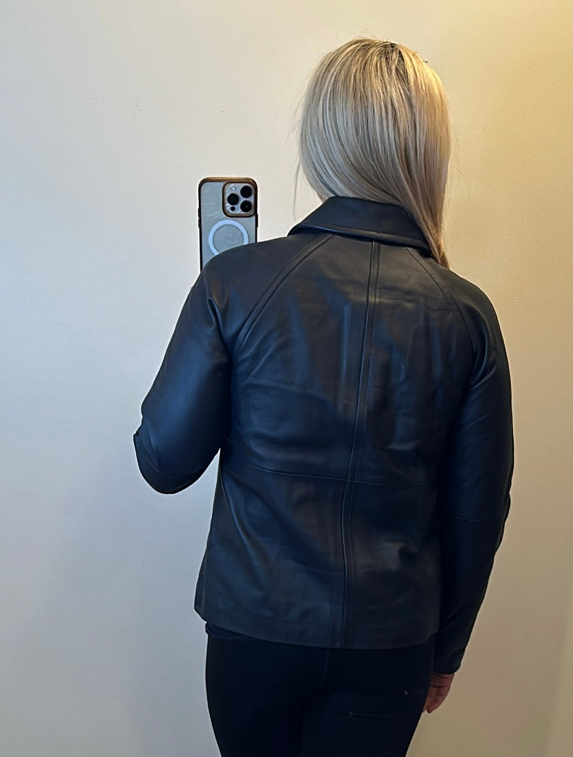 Michael Kors navy leather jacket size M fit upto size 14