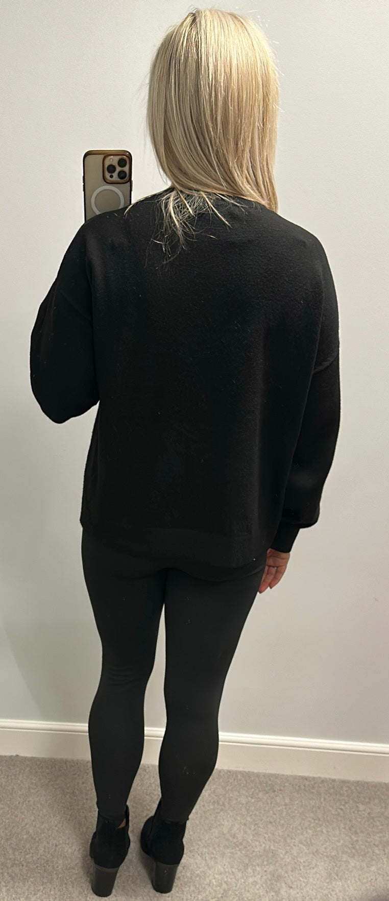 Marks and Spencer’s black sequin jumper size  L Would fit upto size 16