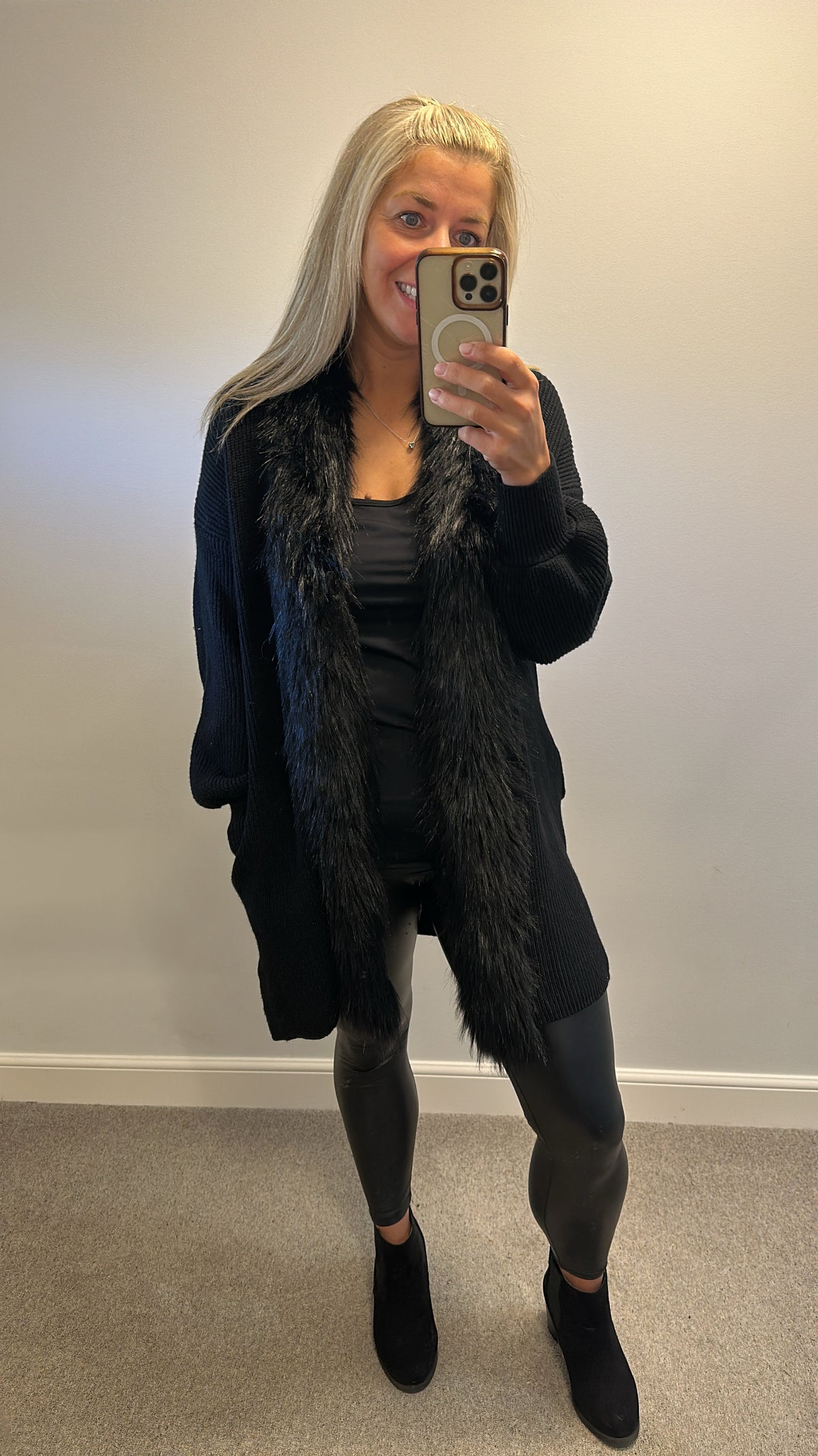 Colynn black faux fur trim knit jumper with pockets one size fitting upto size 16