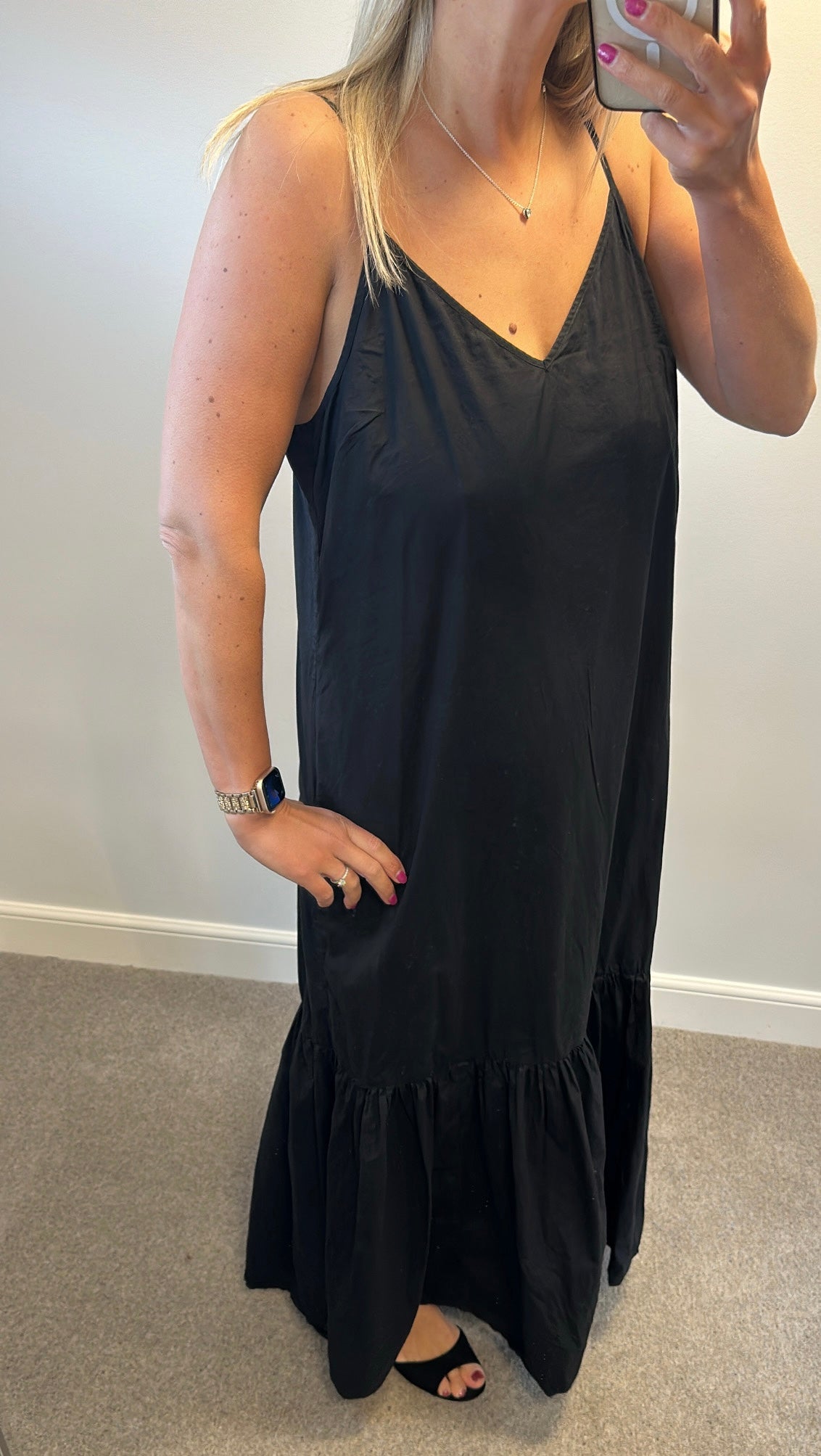 Michael Kors black strappy dress would fit up to size 16