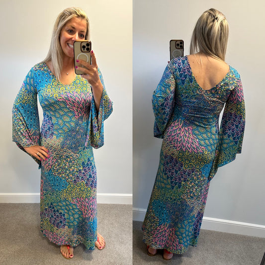 The dress agency turquoise paisley print dress one size would fit upto size 14 brand new without tags