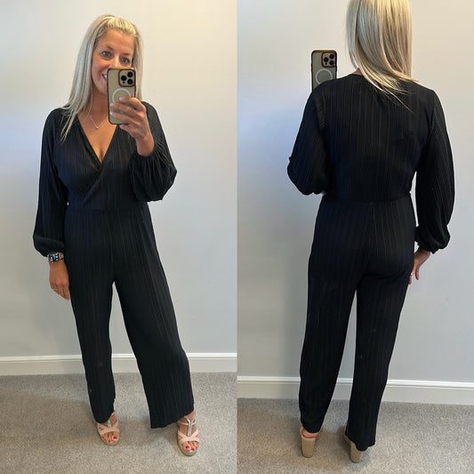 Black pleated jumpsuit would fit upto size 14