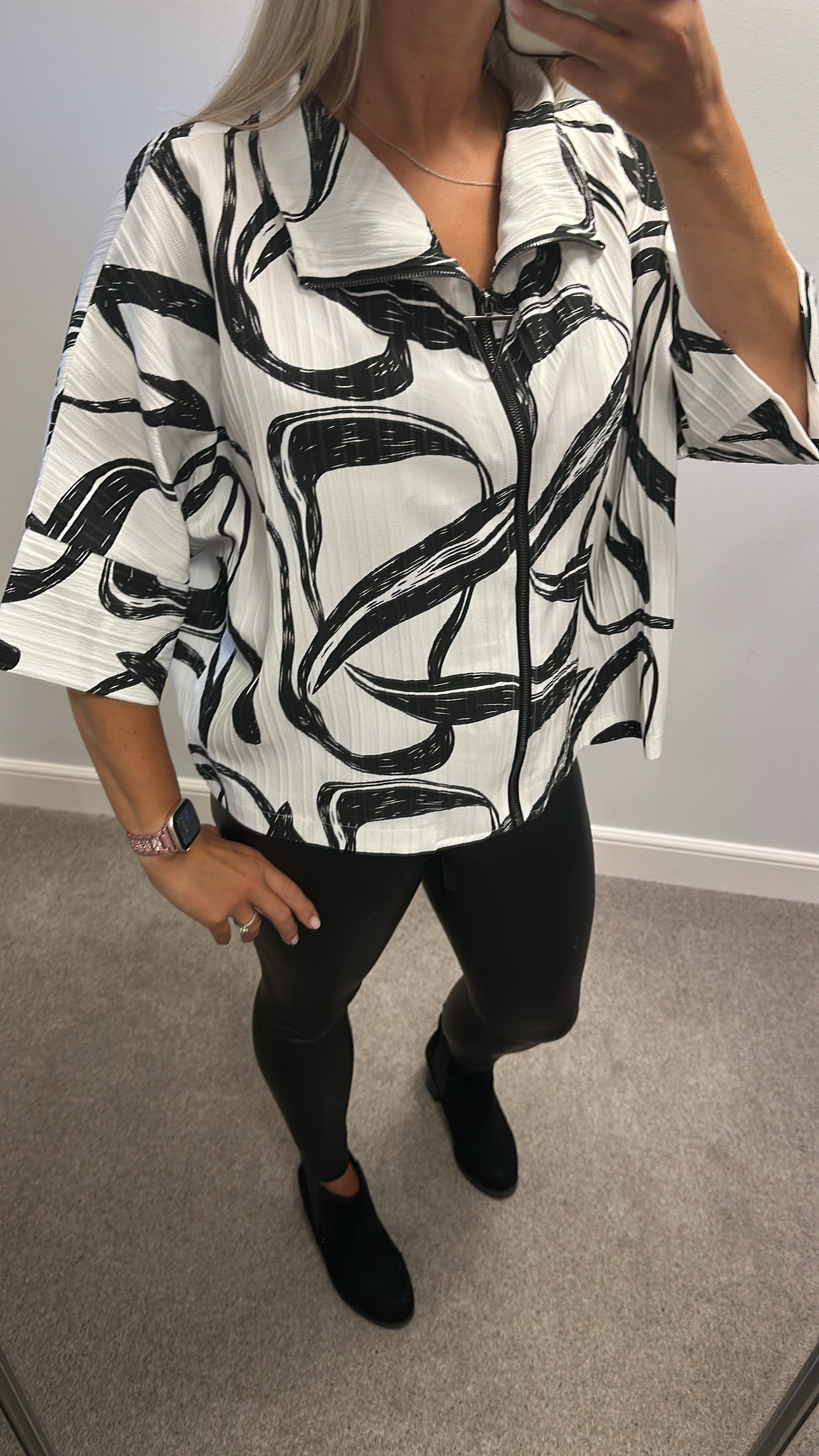 Malissa J white and black print zip top would fit upto size 18