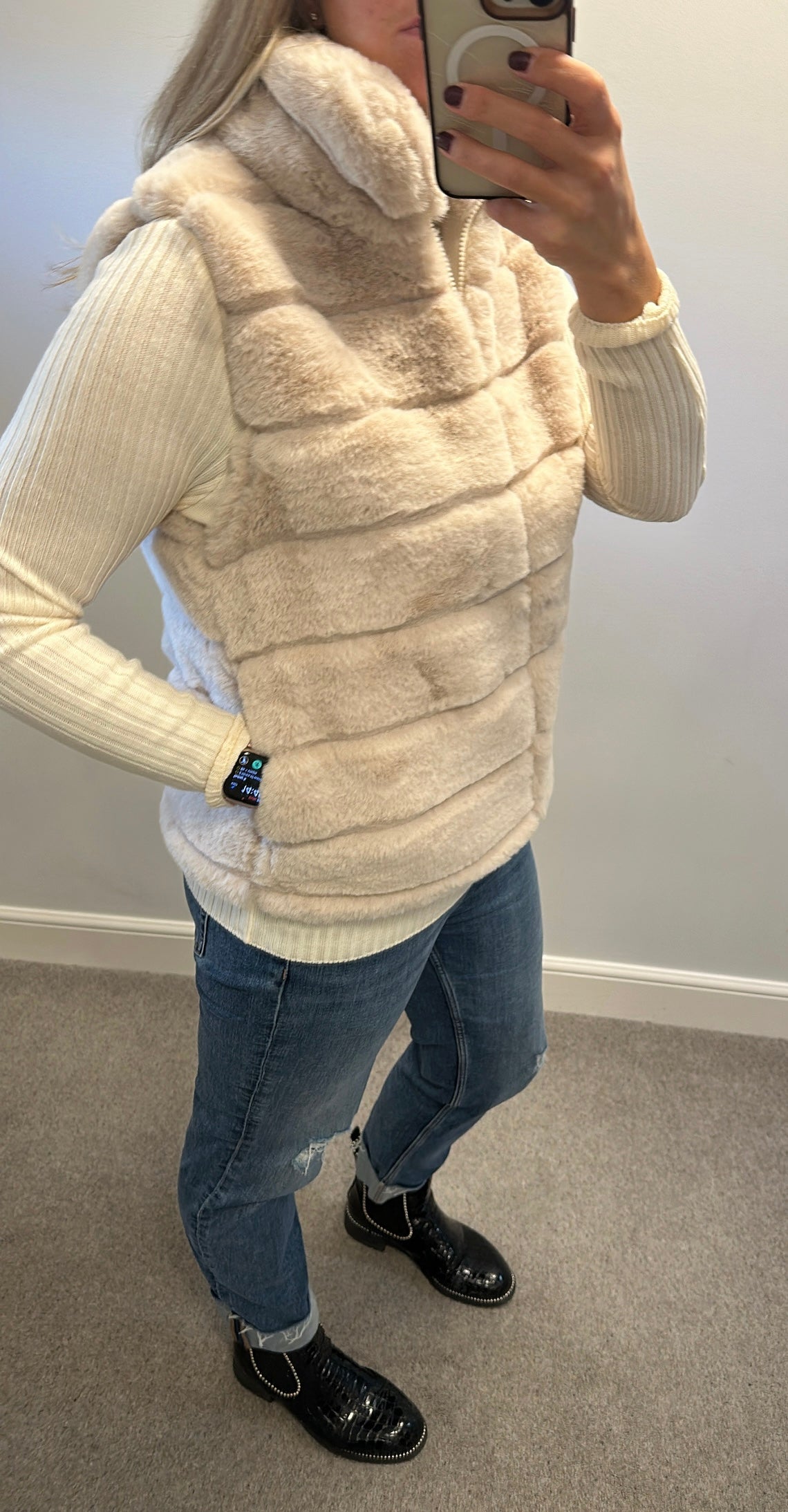 Cream faux fur gilet with zip front would fit upto size 12