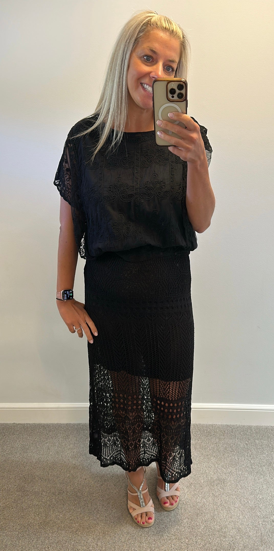 Black lace skirt size L would fit upto size 14