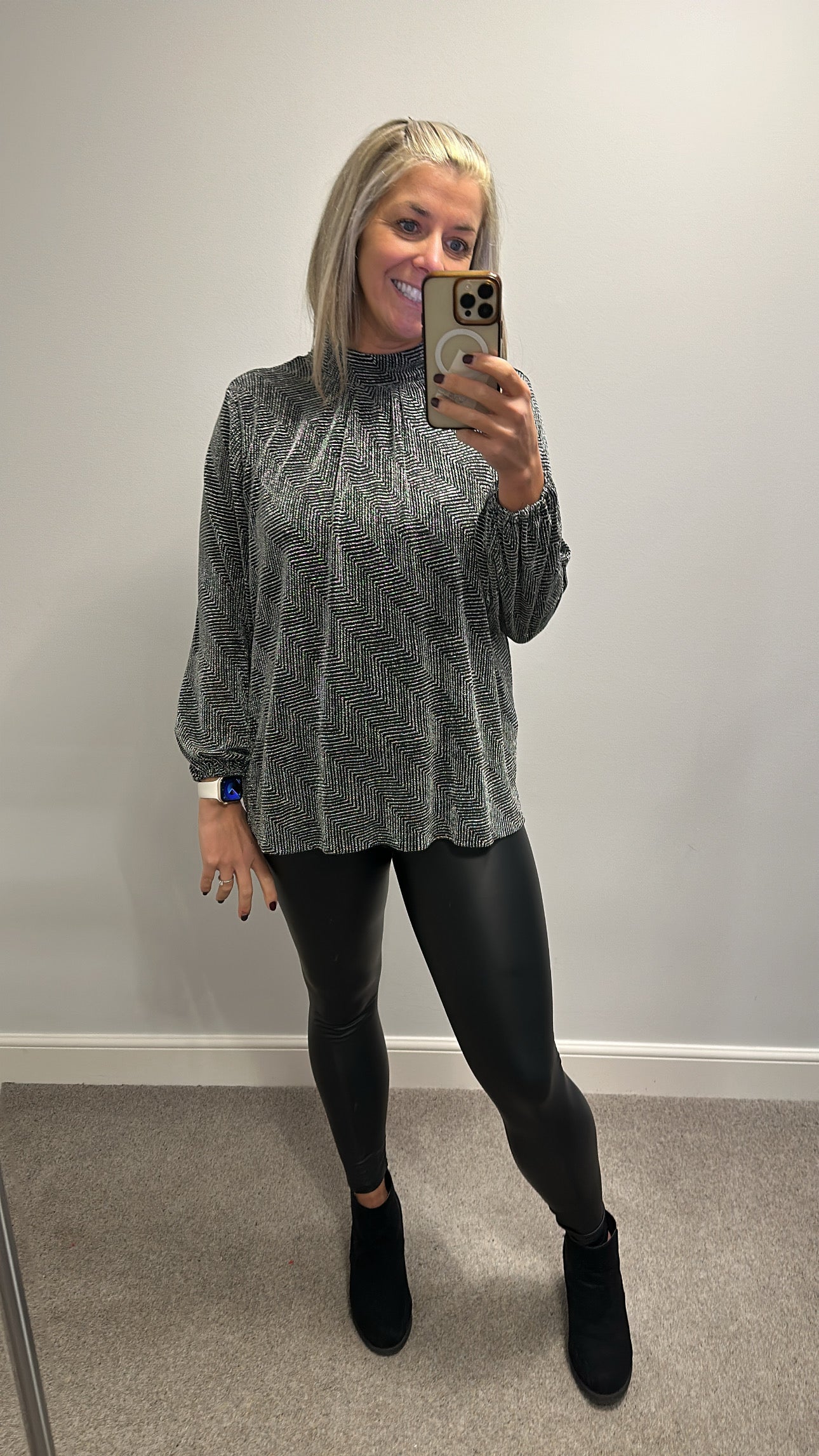 QED London black and silver shimmer top size M would fit upto size 16